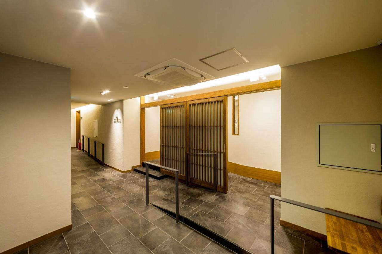 Ookini Hotels Yotsubashi Horie Apartment Osaka Bagian luar foto